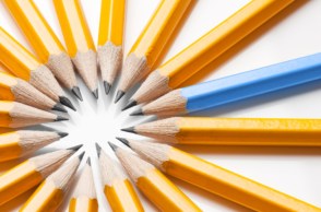 Blue pencil among yellow pencils